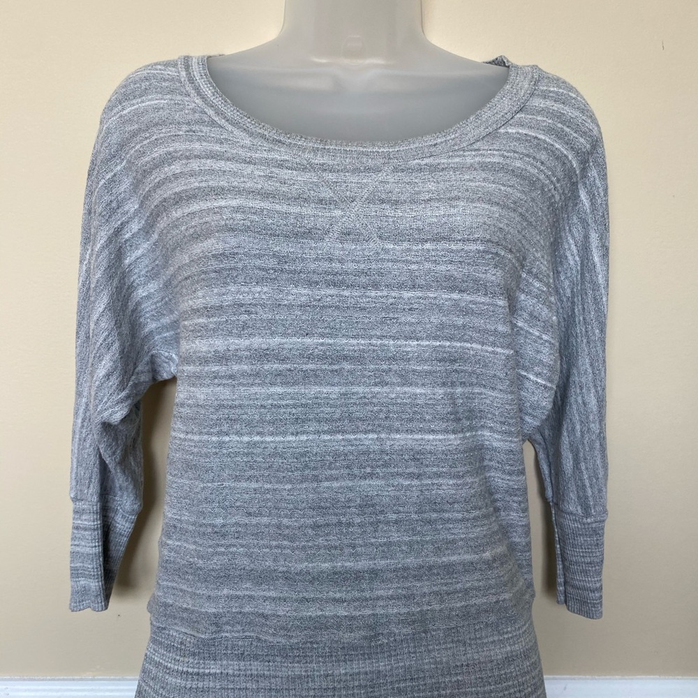 Three quarters length top